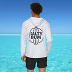 Person wearing a white hoodie with 'Salty Bum' logo in a tropical setting