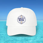 White cap with 'Salty Bum' logo on a clear blue water background