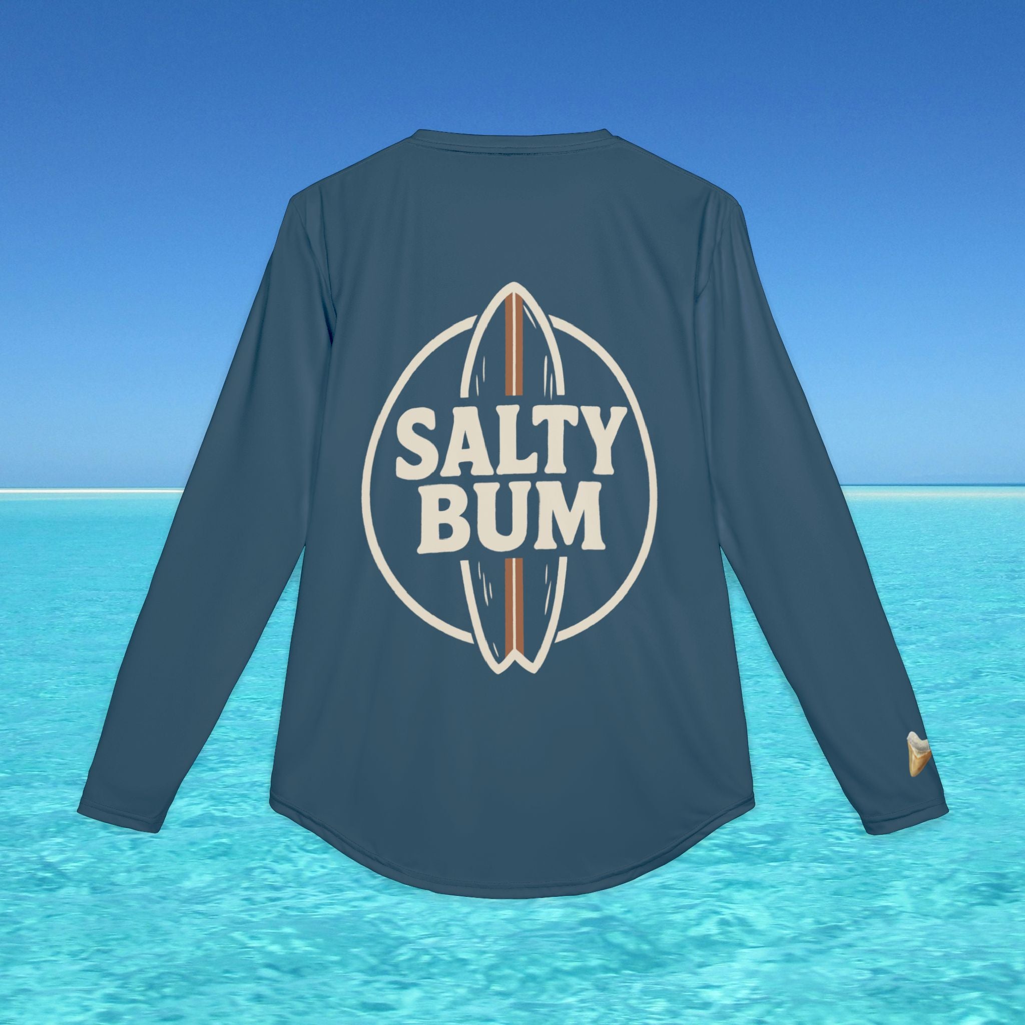 Blue long-sleeve shirt with 'Salty Bum' logo on a beach background