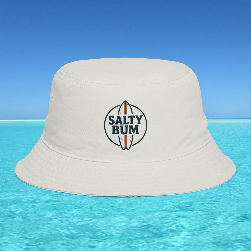 Beige bucket hat with 'Salty Bum' logo on a clear blue water background