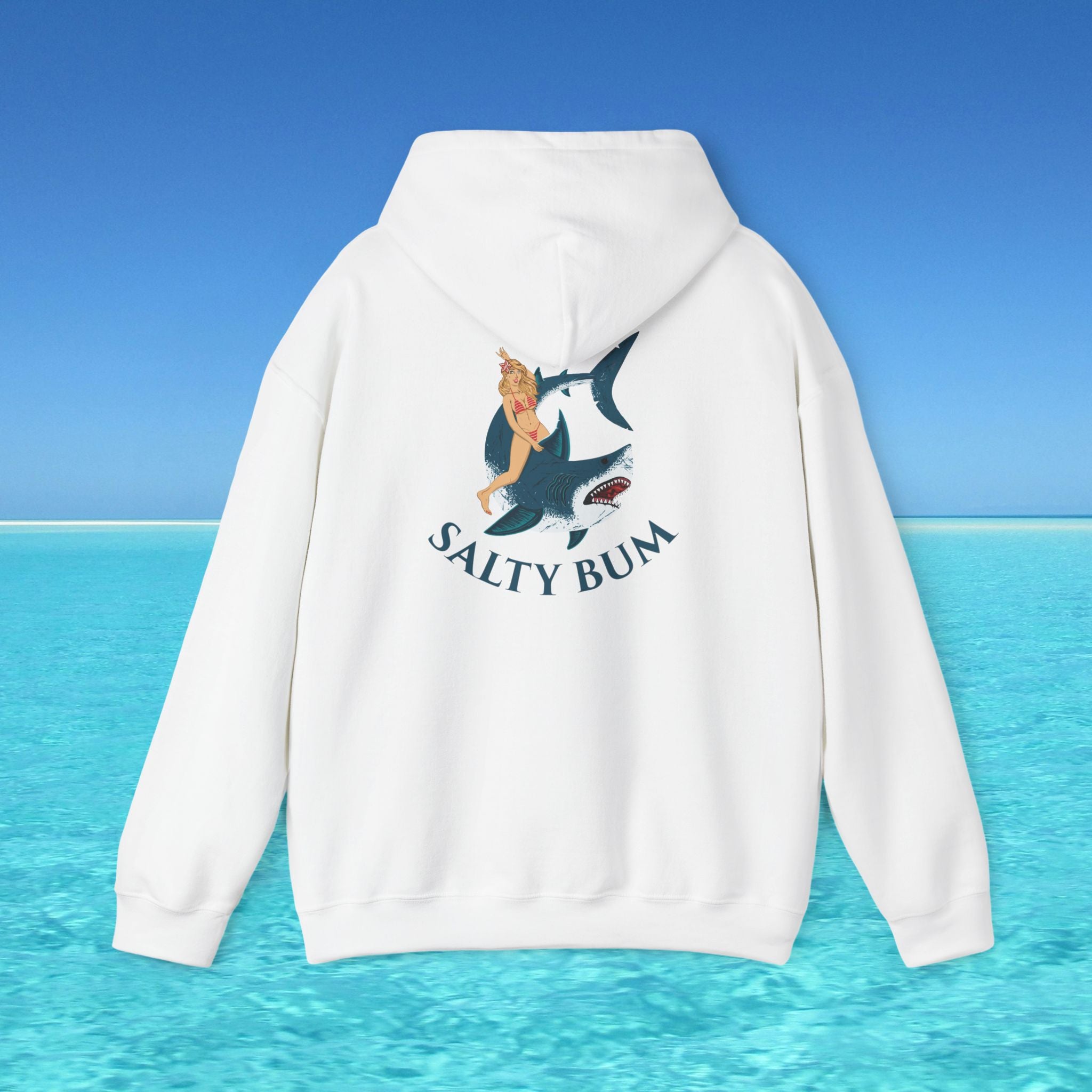 White hoodie with 'Salty Bum' logo on the back against a blue ocean background