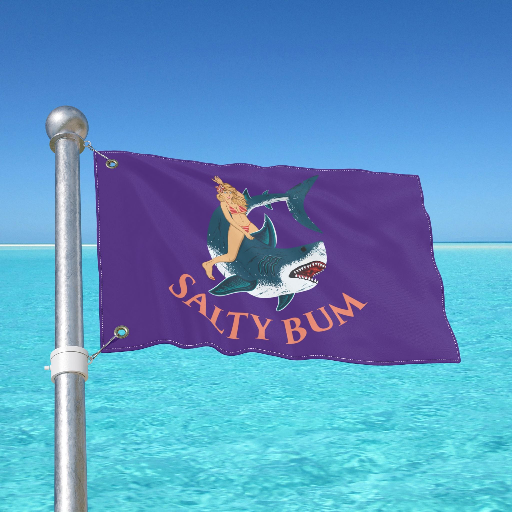 Flag with 'Salty Bum' design on a pole over clear blue water