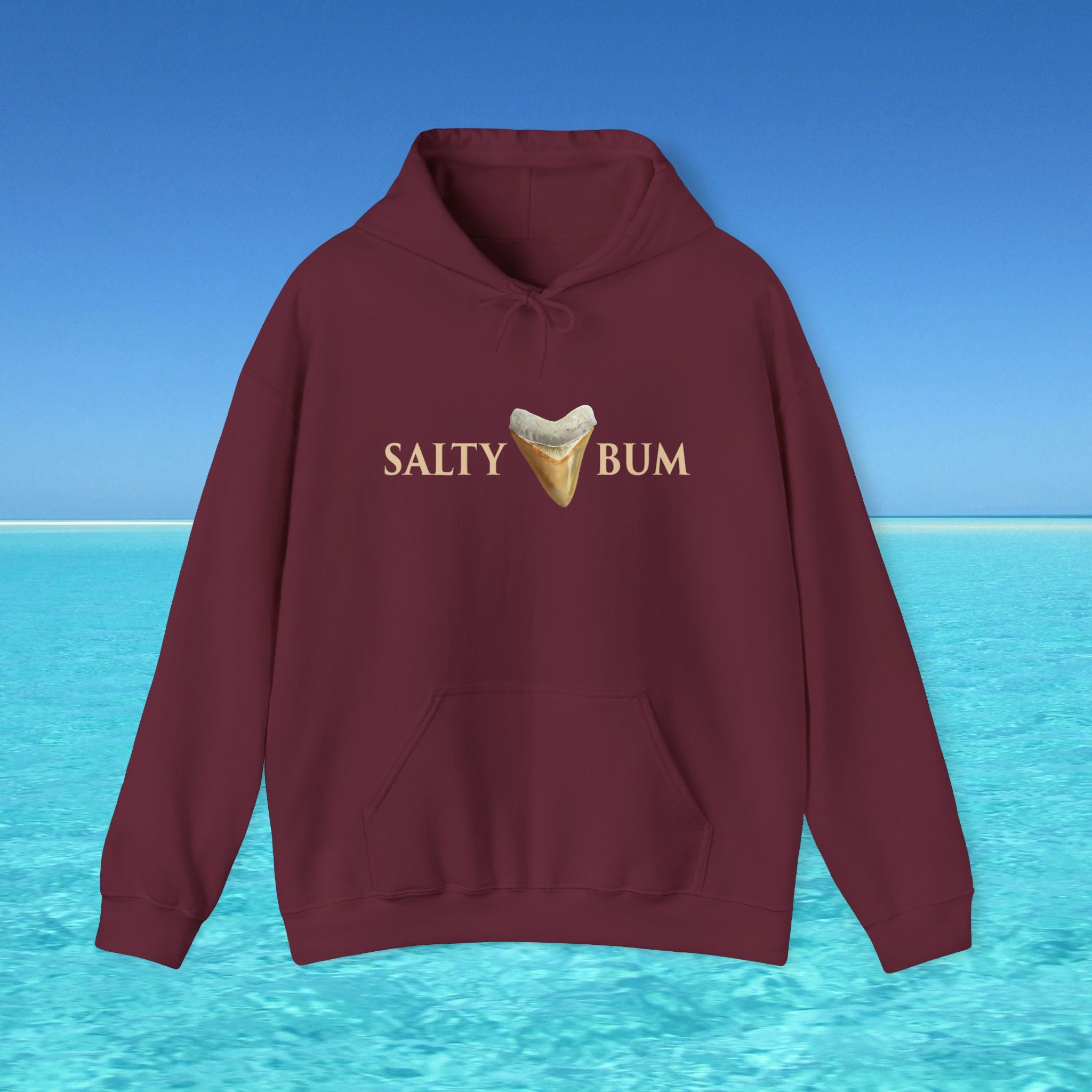 Maroon hoodie with 'Salty Bum' text and ice cream graphic on a blue water and sky background
