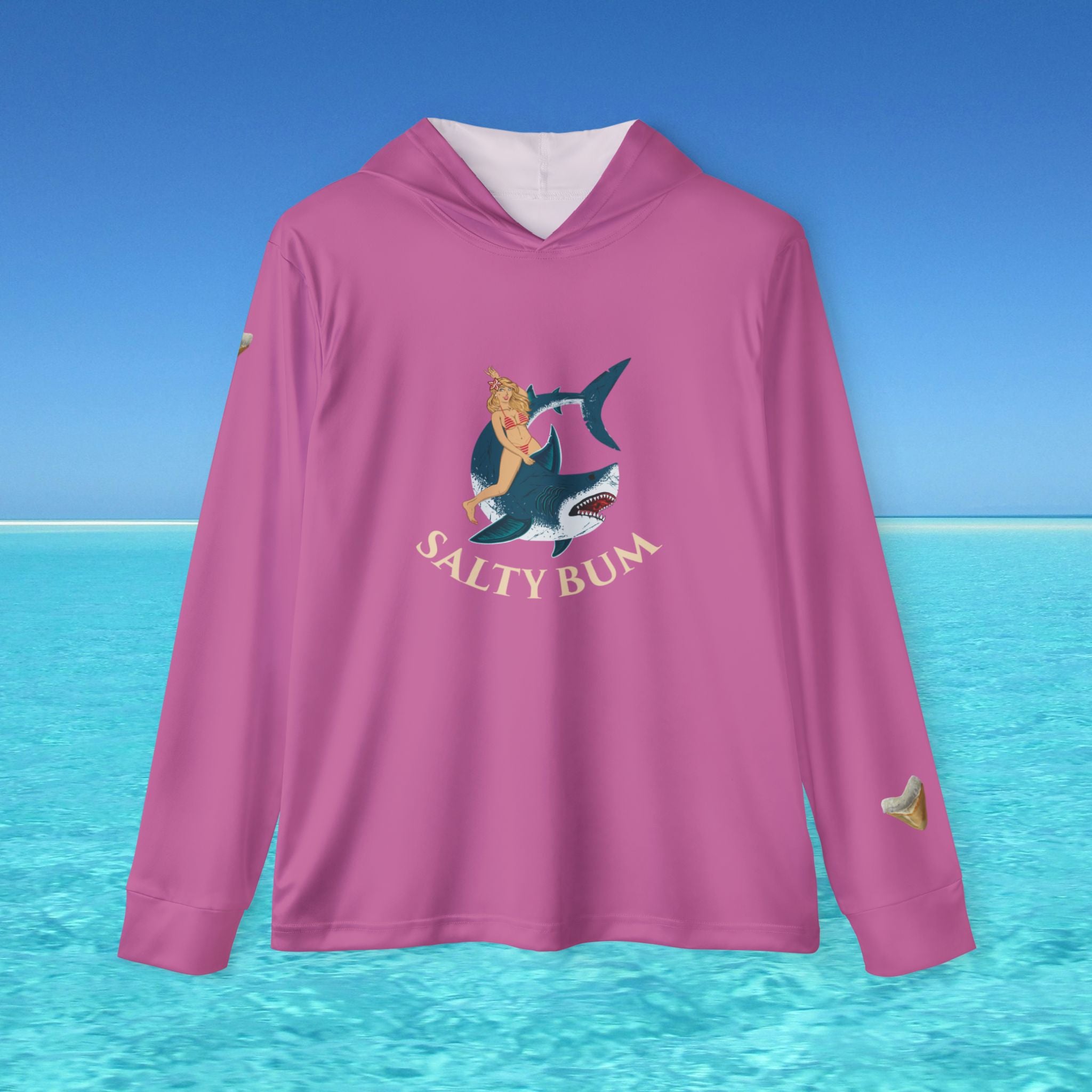 Pink hoodie with 'Salty Bum' design on a blue water and sky background