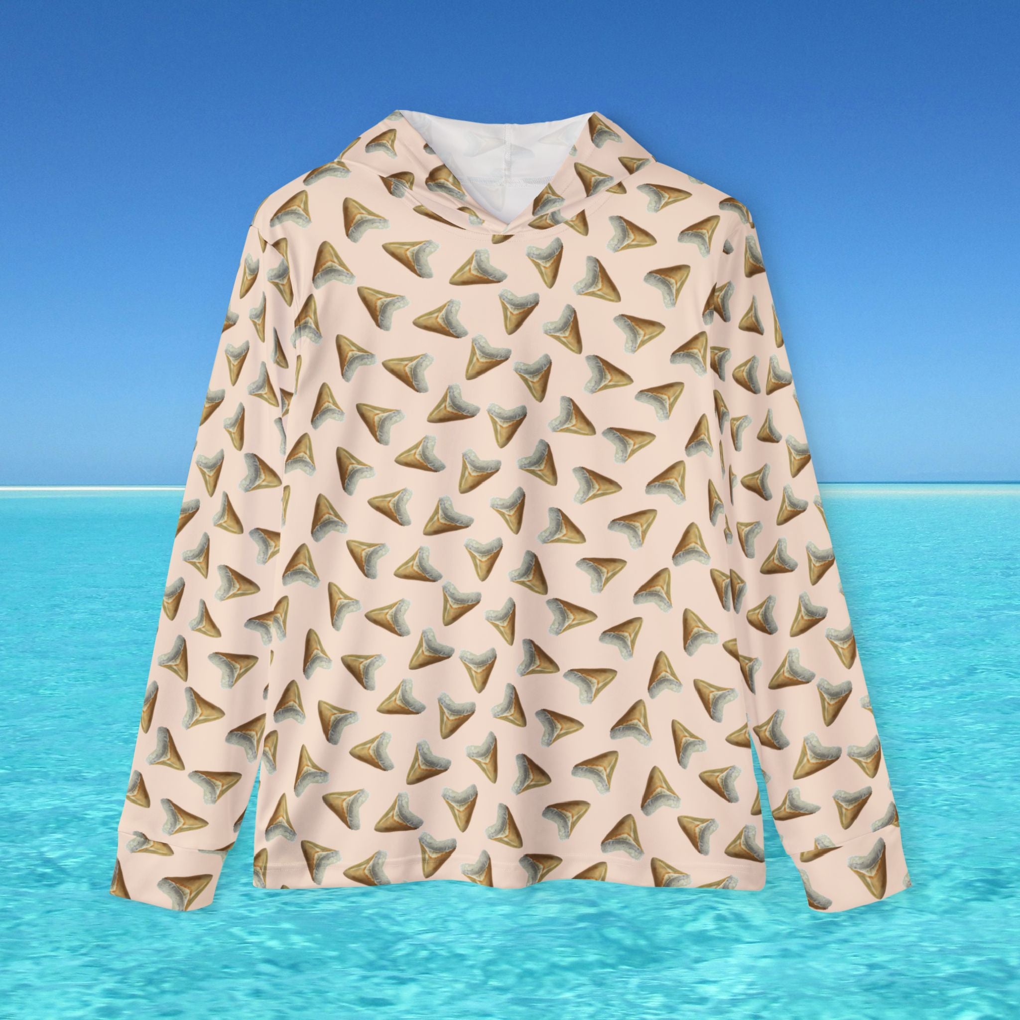 Shirt with shark fin pattern on a beach background