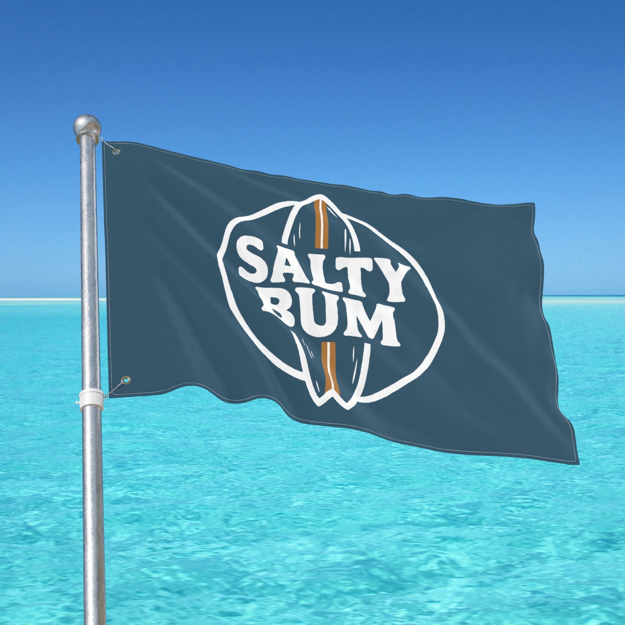 Flag with 'Salty Rum' logo waving in front of a clear blue sky and ocean.