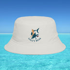 Beige bucket hat with 'Salty Bum' logo on a blue water and sky background