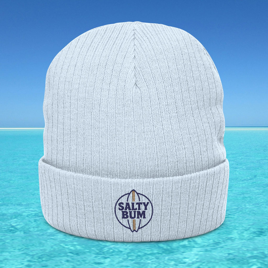 White beanie with 'Salty Bum' logo on a blue water background
