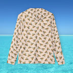 Long-sleeve shirt with geometric pattern on a blue water and sky background