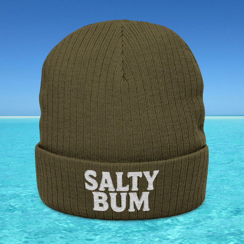 Brown beanie with 'Salty Bum' text on a blue water and sky background