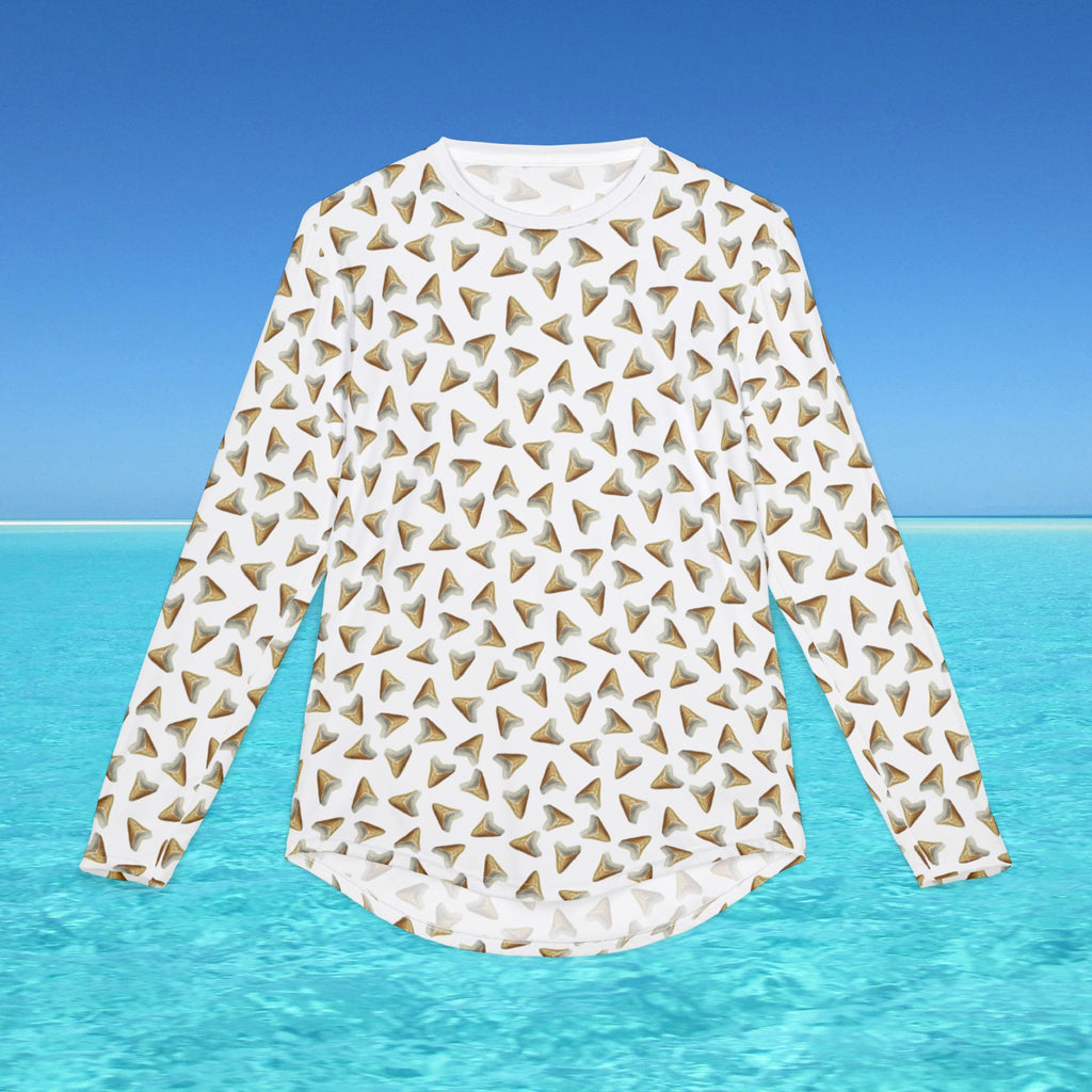 White long-sleeve shirt with geometric pattern on a blue water and sky background