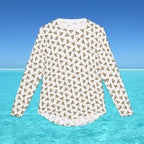 White long-sleeve shirt with geometric pattern on a blue water and sky background