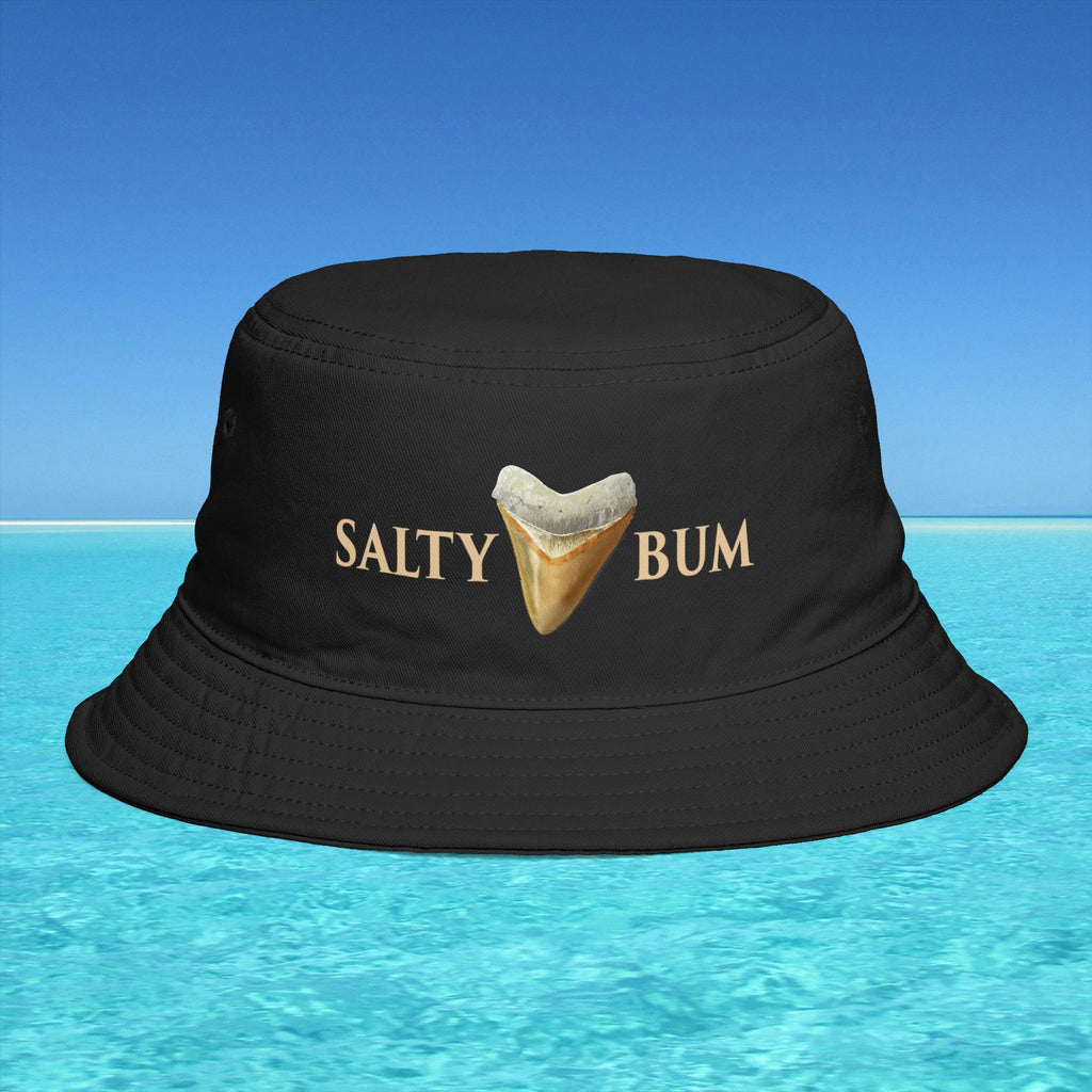 Black bucket hat with 'Salty Bum' text and shark tooth graphic on a blue water background