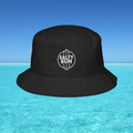 Black bucket hat with 'Salty Bum' logo on a blue water background