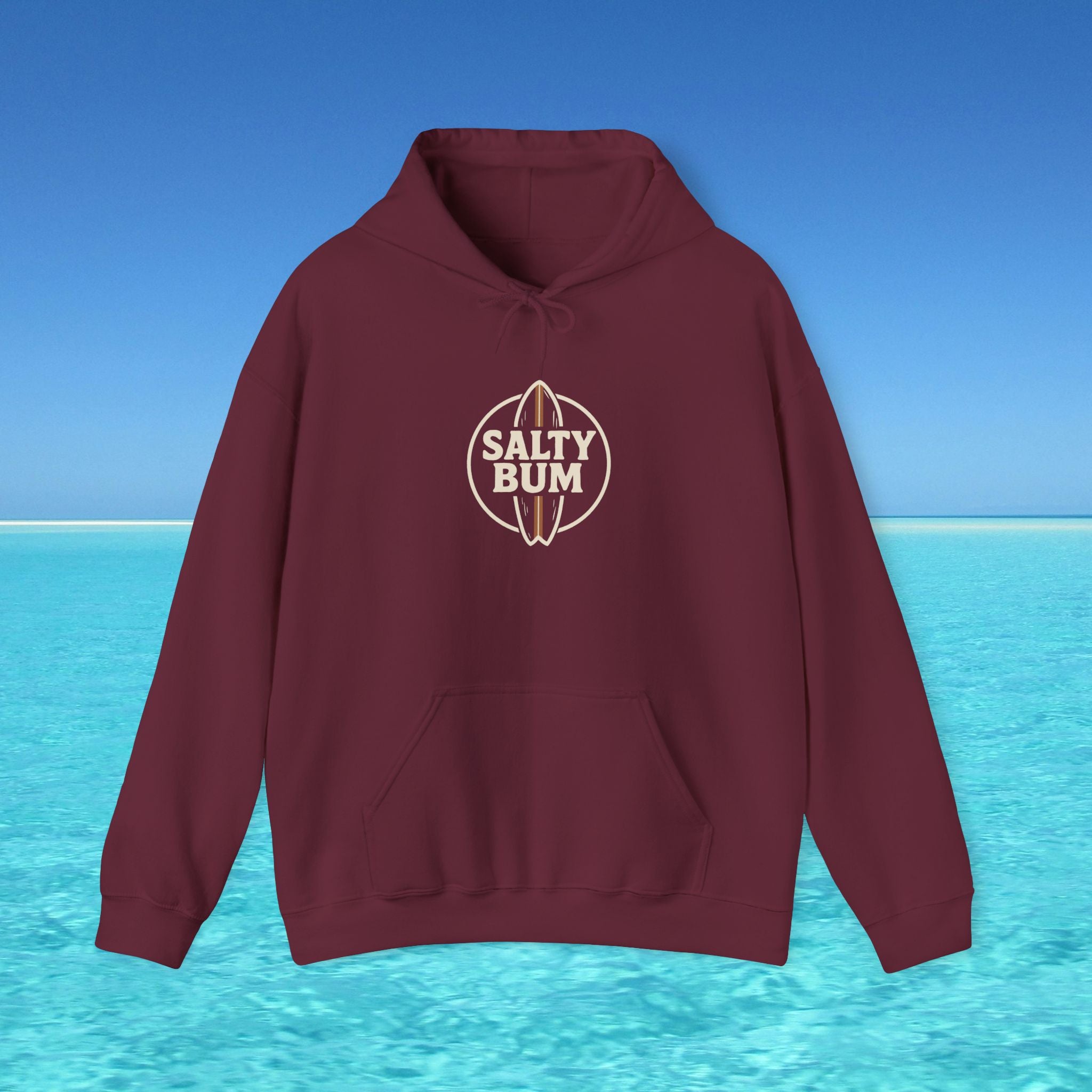 Maroon hoodie with 'Salty Bum' logo on a blue water and sky background
