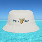 Beige bucket hat with 'Salty Bum' text and shark tooth graphic on a blue water and sky background