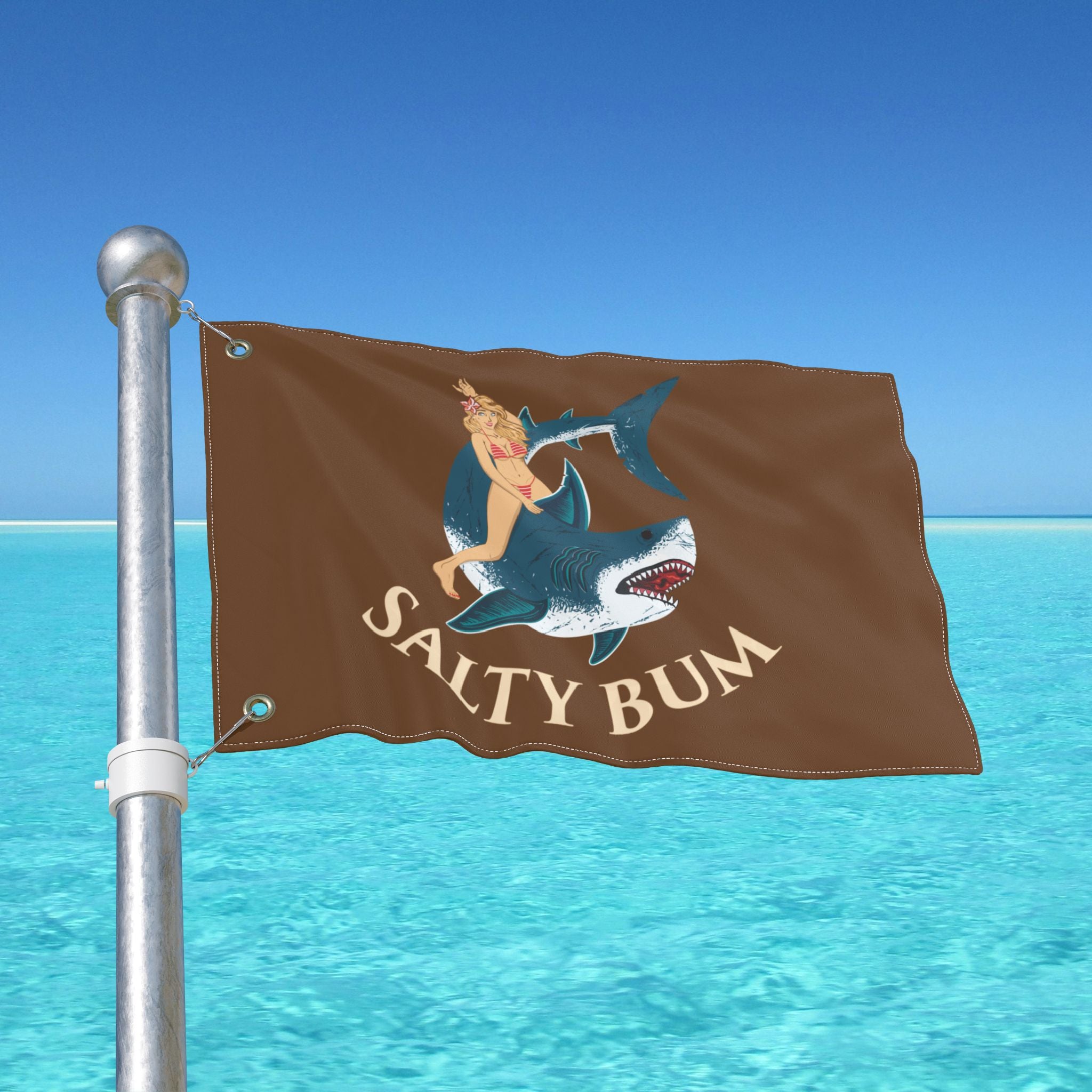 Flag with 'Salty Bum' design featuring a woman on a shark against a blue ocean and sky background.