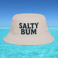 Beige bucket hat with 'Salty Bum' text on a blue water and sky background