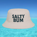Beige bucket hat with 'Salty Bum' text on a blue water and sky background