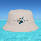 Beige bucket hat with 'Salty Bum' design on a blue water and sky background