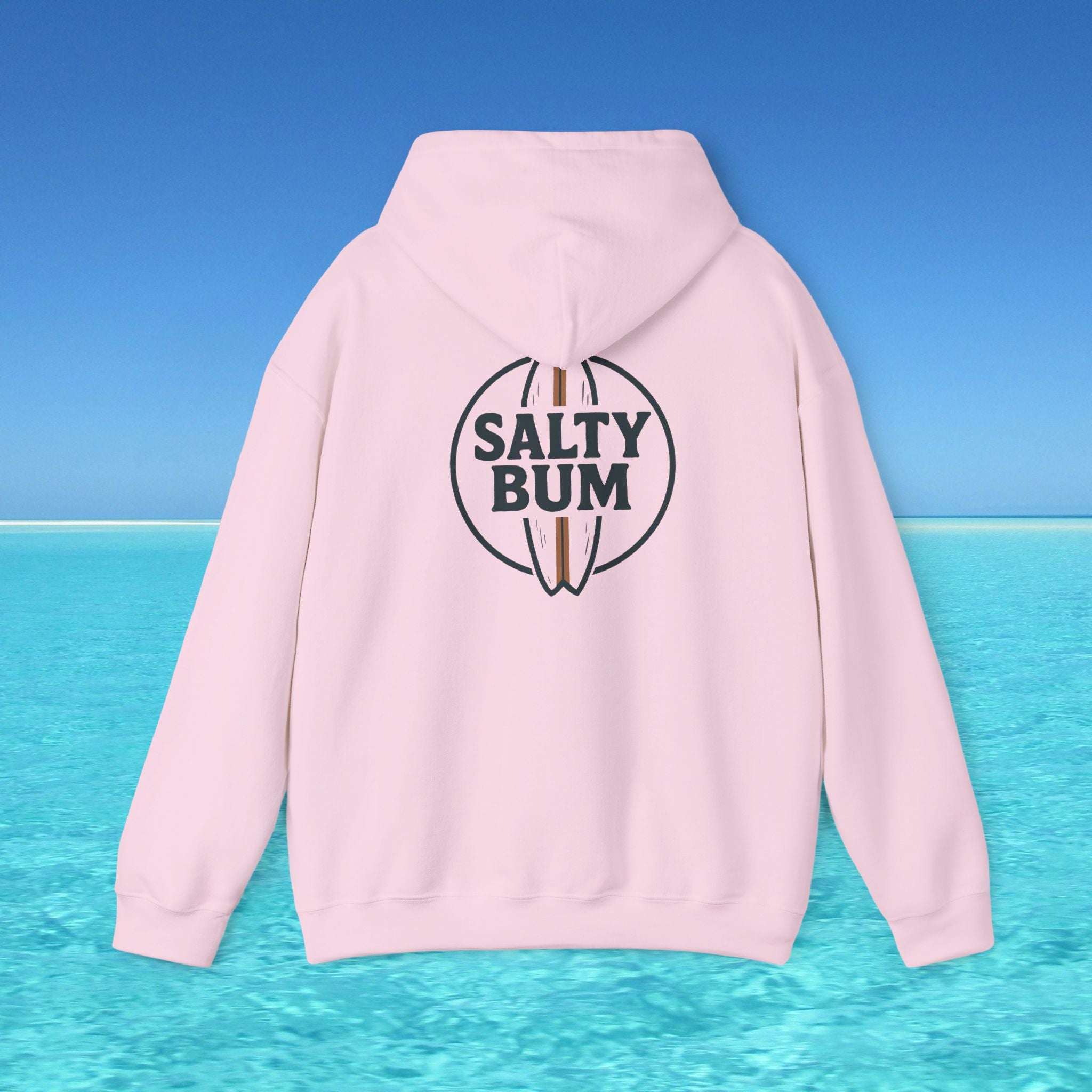 Pink hoodie with 'Salty Bum' logo on a blue water and sky background