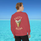 Person wearing a red sweatshirt with 'Salty Bum' text and ice cream graphic, standing in front of a blue ocean.