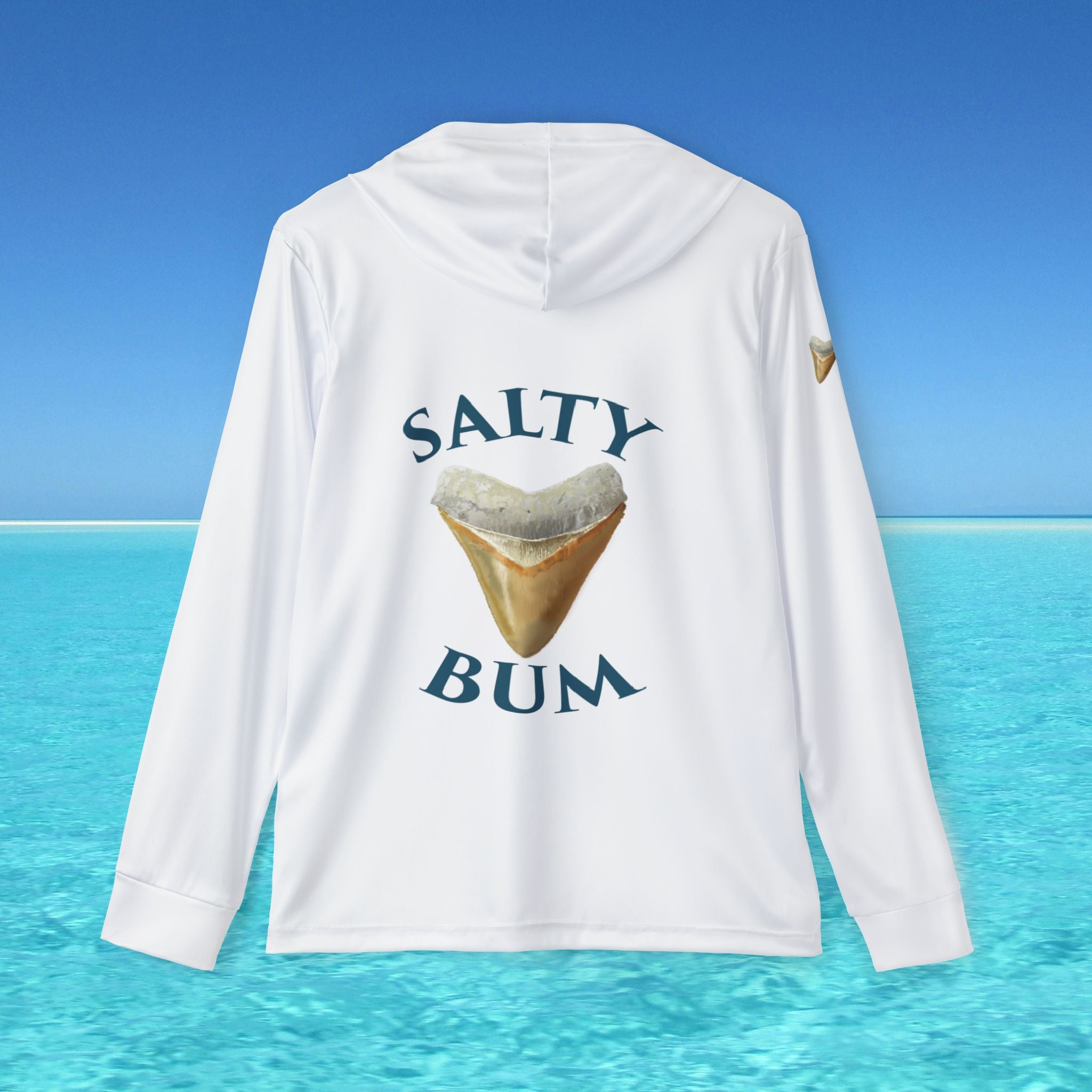 White hoodie with 'Salty Bum' text and shark tooth graphic on a blue ocean background