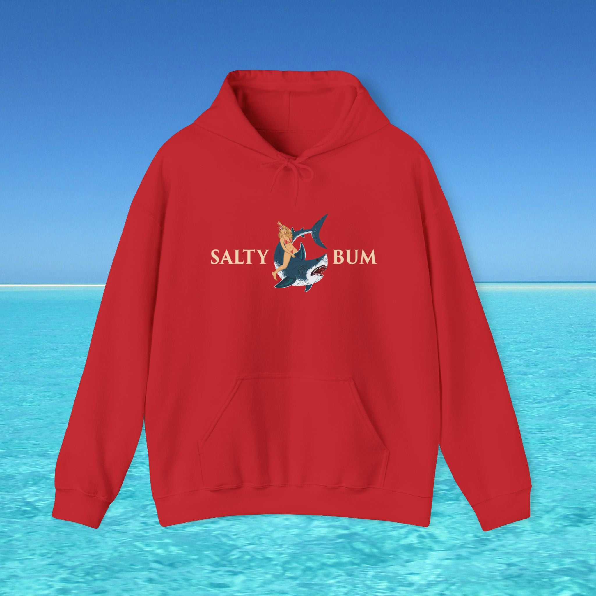 Red hoodie with 'Salty Bum' logo on a blue water and sky background