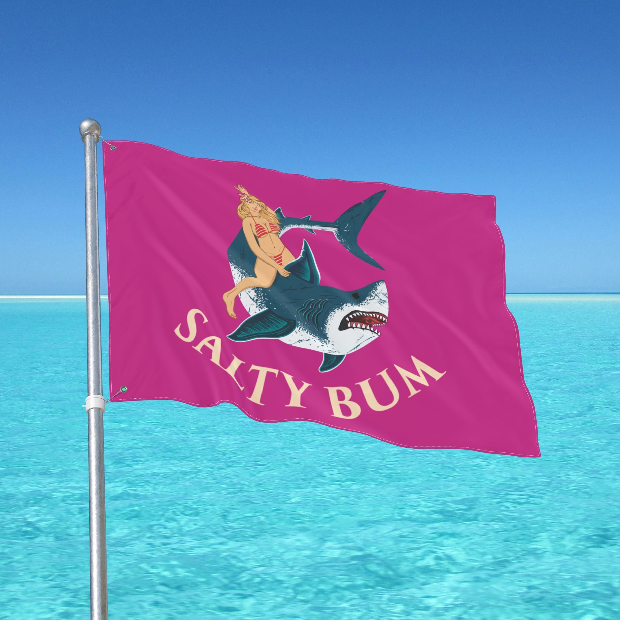 Flag with shark and bikini woman design against a blue ocean background